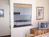 <p>Wohnzimmer - Blick in die Küche</p>